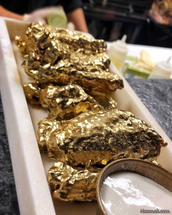 بال و کتف در کره نارگیل بال مرغ با لایه طلا