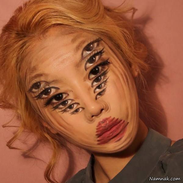 نقاشی روی صورت آرایشگر زن نقاشی روی صورت آرایشگر زن