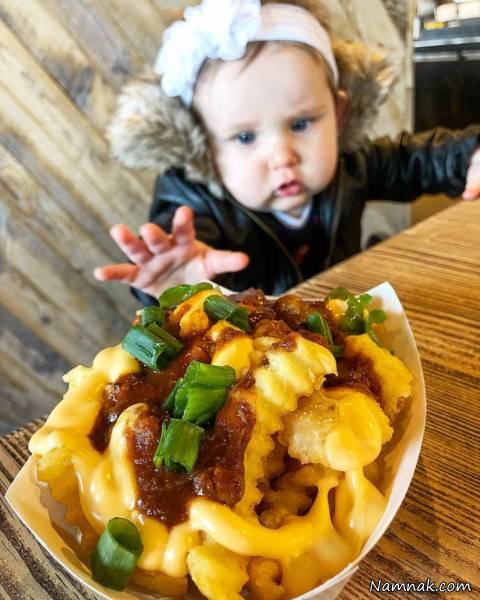 دختر بچه شکمو و بامزه دختر بچه شکمو